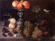 Still life of grapes on a pewter dish,together with peaches,nuts,a glass roemer and a silver tazza containing apples and pears,and a blue-tit